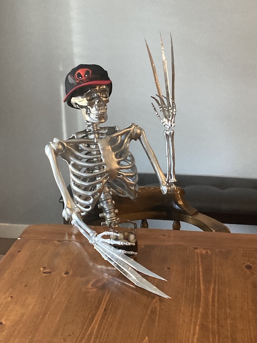 skeleton painted silver, AKA Wolverine